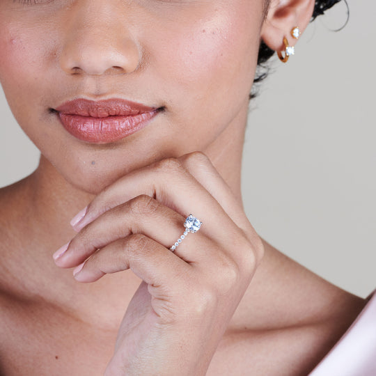 Model Wearing 1 3/4 cttw Round Cut Under Bezeled Accent Diamond Engagement Ring view