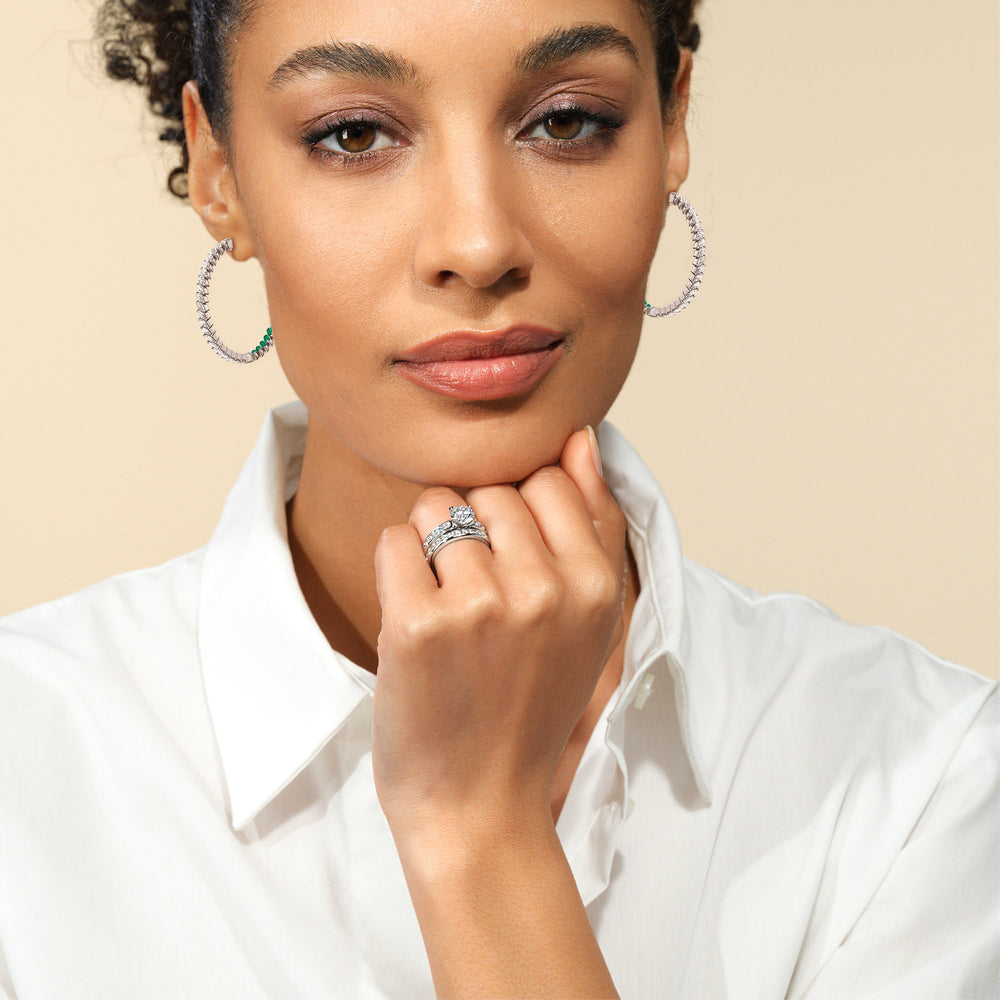 Model Wearing Marquise Diamond and Created Emerald Inside-Out Large Hoop Earrings view