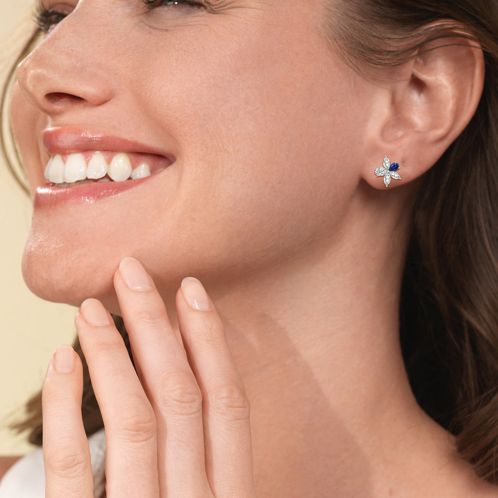 Model Wearing Sapphire Petal Plumeria Studs view