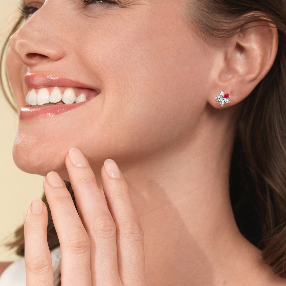 Model Wearing Ruby Petal Plumeria Studs view