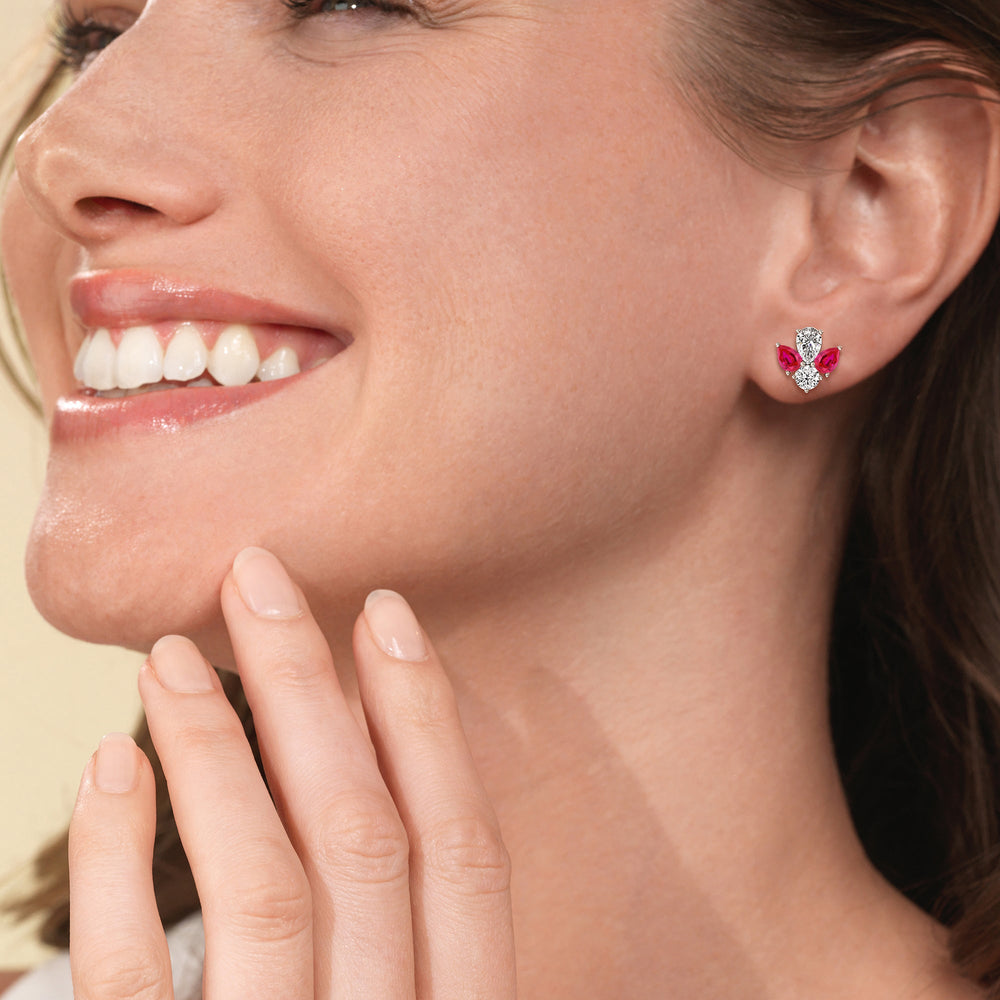 Model Wearing Classic Pear Created Ruby and Round Diamonds Cluster Earrings view