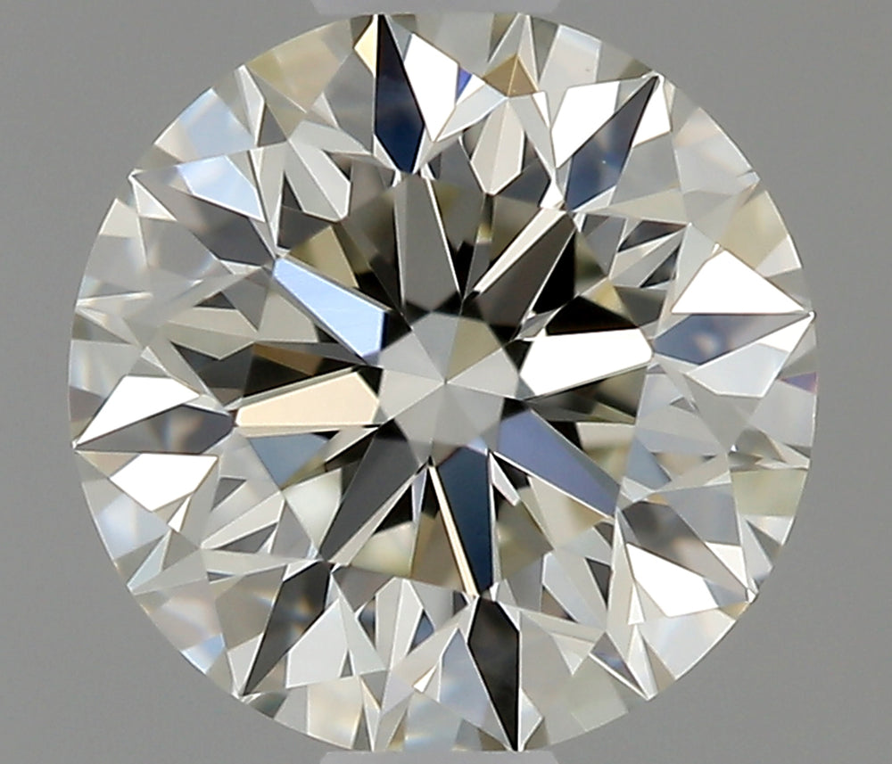 0.6 Carat Round Natural Diamond with  Cut Diamond in 14KT  view 1
