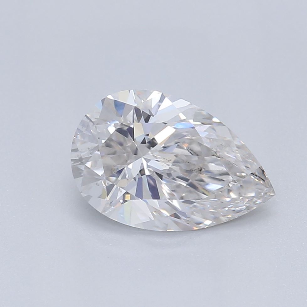 0.62 Carat Pear Lab Diamond with  Cut Diamond in 14KT  view 1
