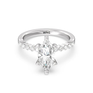 under bezeled accent diamond engagement ring