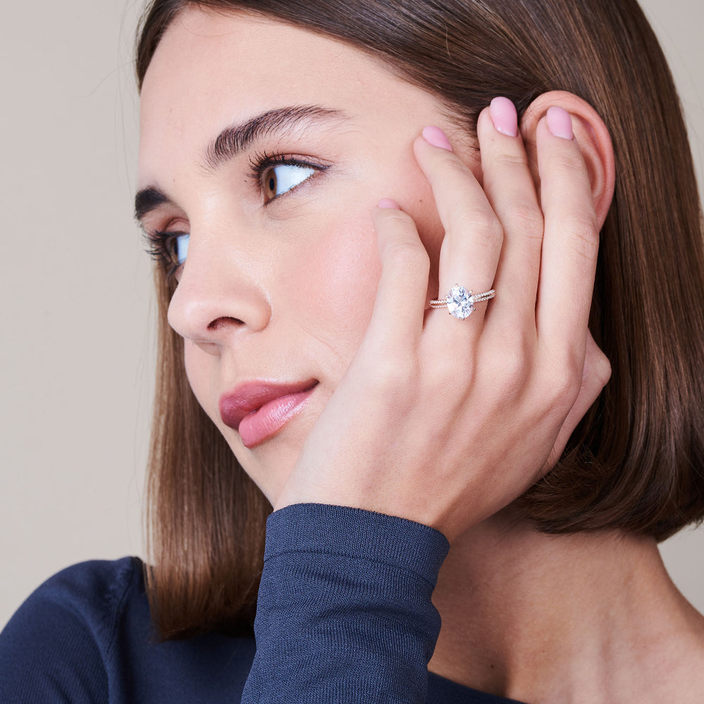 Model Wearing Fine Line 6 Claw Knife Edge Engagement Ring with Lab Grown Diamond view