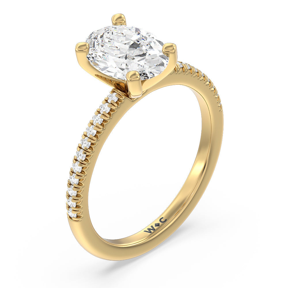 Vela Petite French Set Diamond Engagement Ring with Oval Cut Diamond in 14KT Yellow Gold view 3
