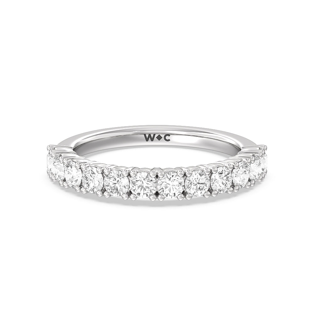 Emerald and Round Side Stone Diamond Wedding Band with Platinum Cut Diamond in 14KT Platinum view 1
