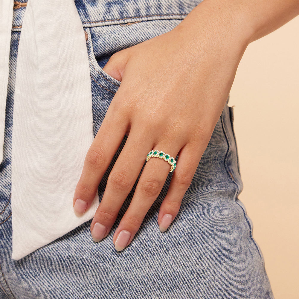 Model Wearing Created Emerald Round Halo Eternity Ring view