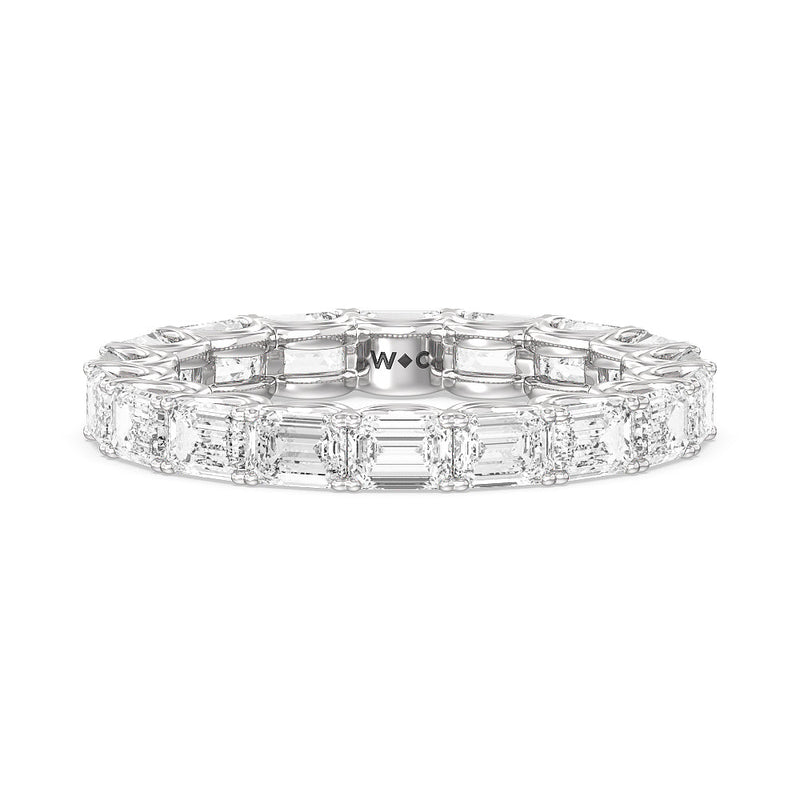 Emerald Split Prong Waves Eternity Ring