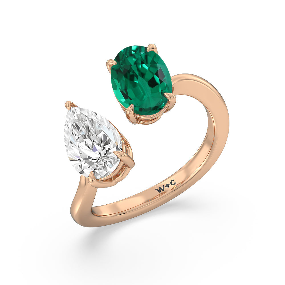 Toi et Moi Created Emerald Oval and Pear Diamond Curved Engagement Ring with 14KT Rose Gold Cut Diamond in 14KT Rose Gold view 2
