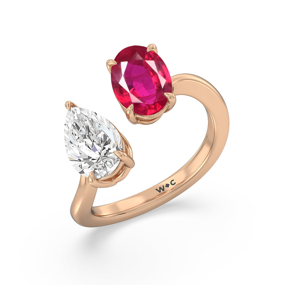 Toi et Moi Created Ruby Oval and Pear Diamond Curved Engagement Ring with 14KT Rose Gold Cut Diamond in 14KT Rose Gold view 2
