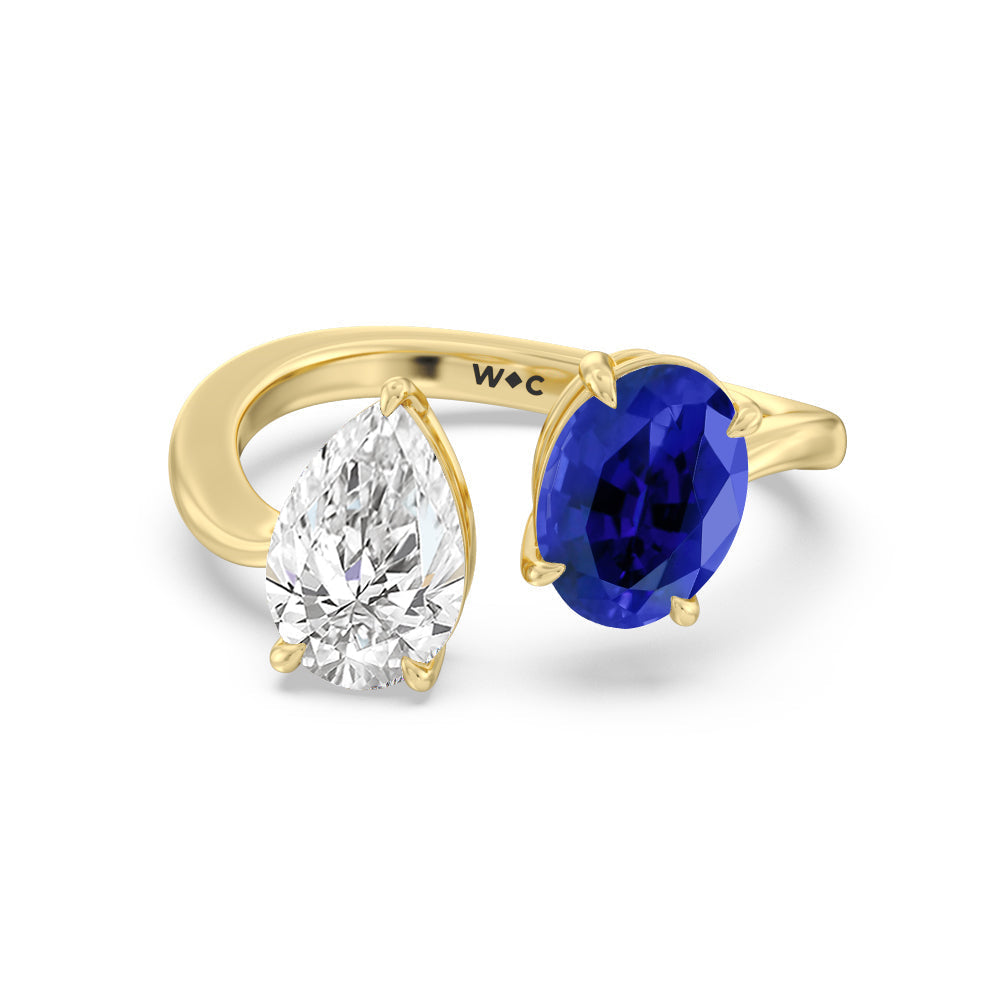 Toi et Moi Created Sapphire Oval and Pear Diamond Curved Engagement Ring with 14KT Yellow Gold Cut Diamond in 14KT Yellow Gold view 1
