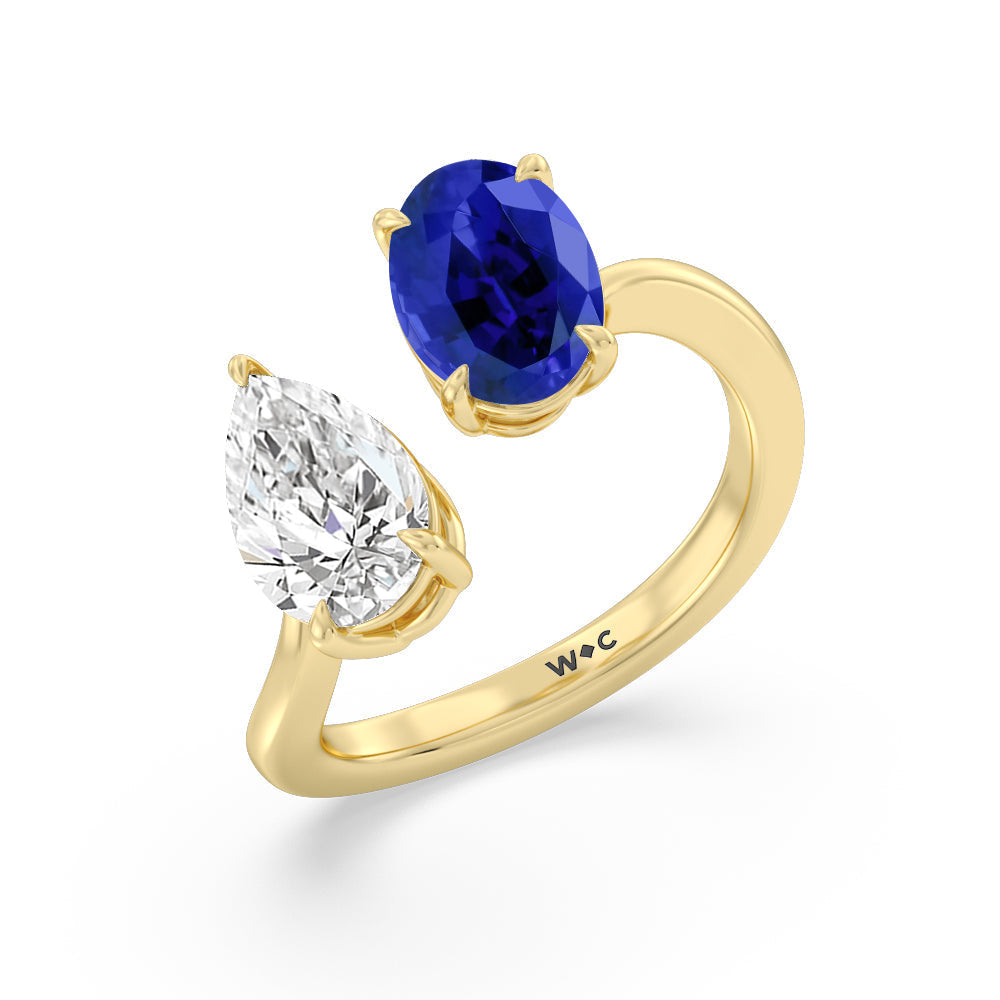 Toi et Moi Created Sapphire Oval and Pear Diamond Curved Engagement Ring with 14KT Yellow Gold Cut Diamond in 14KT Yellow Gold view 2

