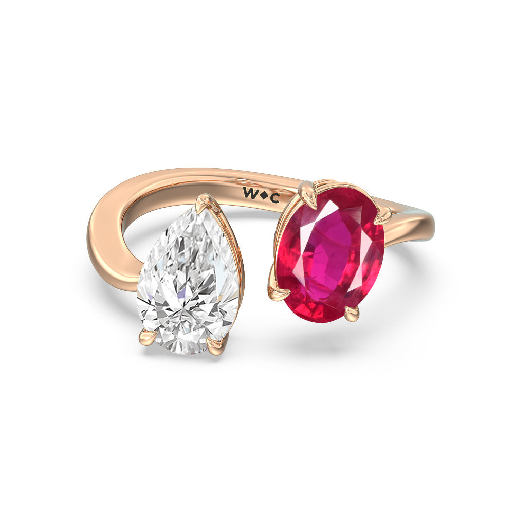 Toi et Moi Created Ruby Oval and Pear Diamond Curved Engagement Ring with 14KT Rose Gold Cut Diamond in 14KT Rose Gold view 1
