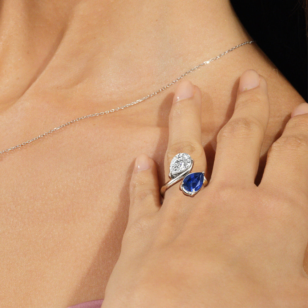 Model Wearing Toi et Moi Created Sapphire and Lab Diamond Bypass Engagement Ring view