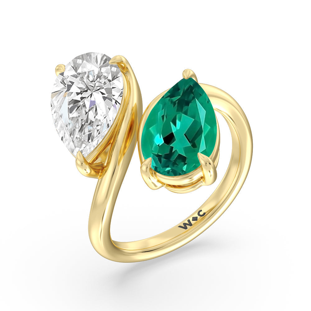 Toi et Moi Created Emerald and Lab Diamond Bypass Engagement Ring with 14KT Yellow Gold Cut Diamond in 14KT Yellow Gold view 2
