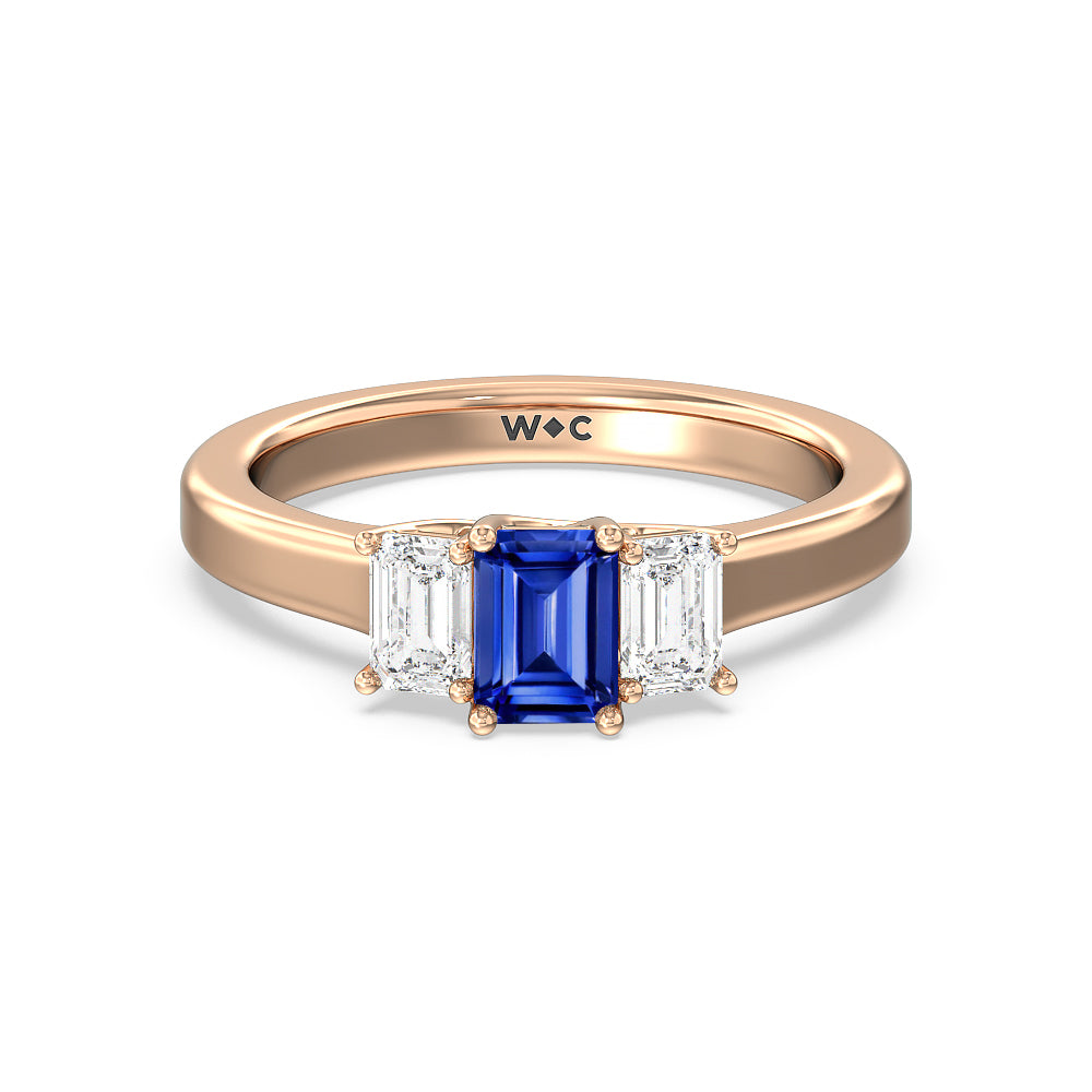 Created Sapphire Center And Emerald Cut Three Stone Diamond Ring with 14KT Rose Gold Cut Diamond in 14KT Rose Gold view 1
