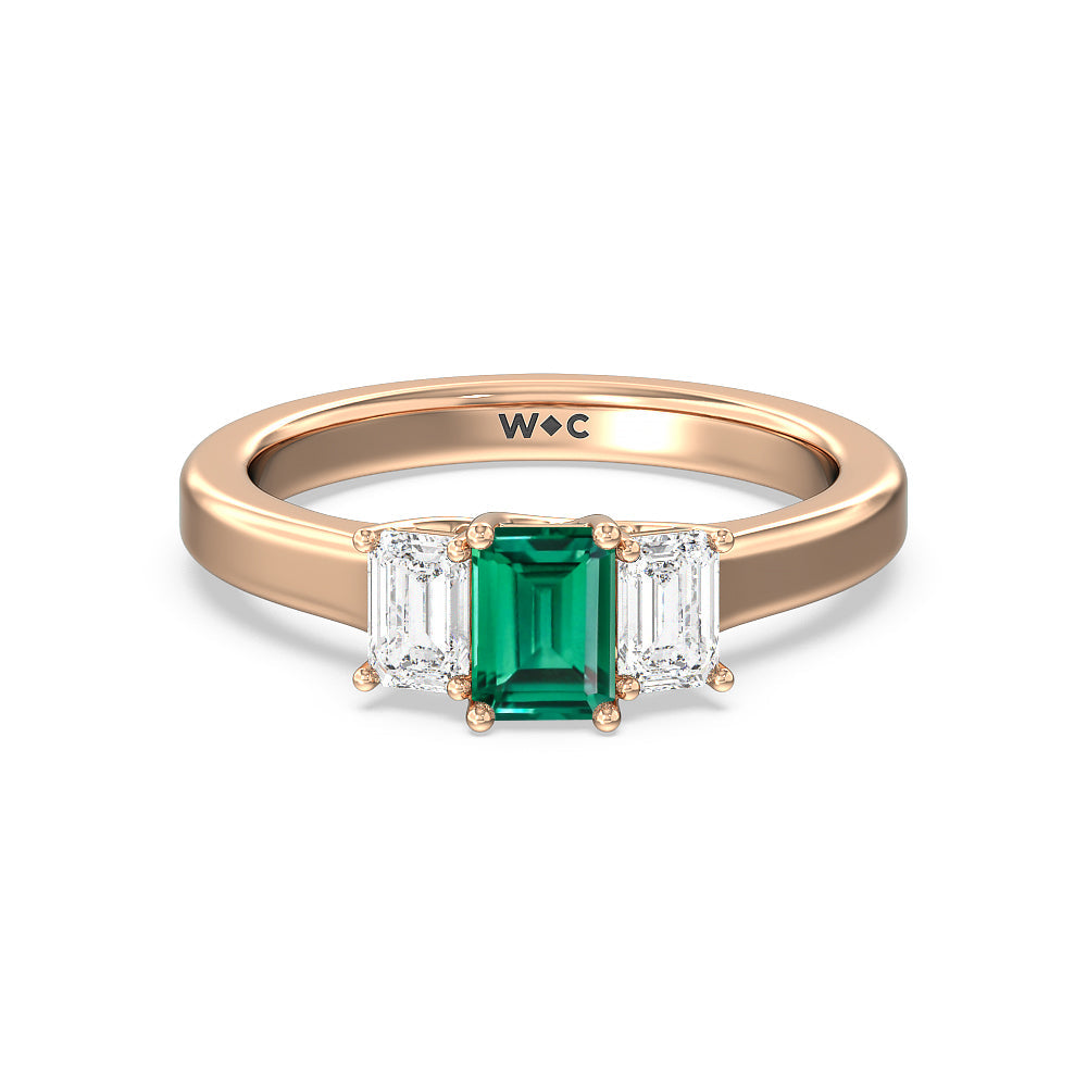 Created Emerald Center And Emerald Shape Cut Three Stone Diamond Ring with 14KT Rose Gold Cut Diamond in 14KT Rose Gold view 1
