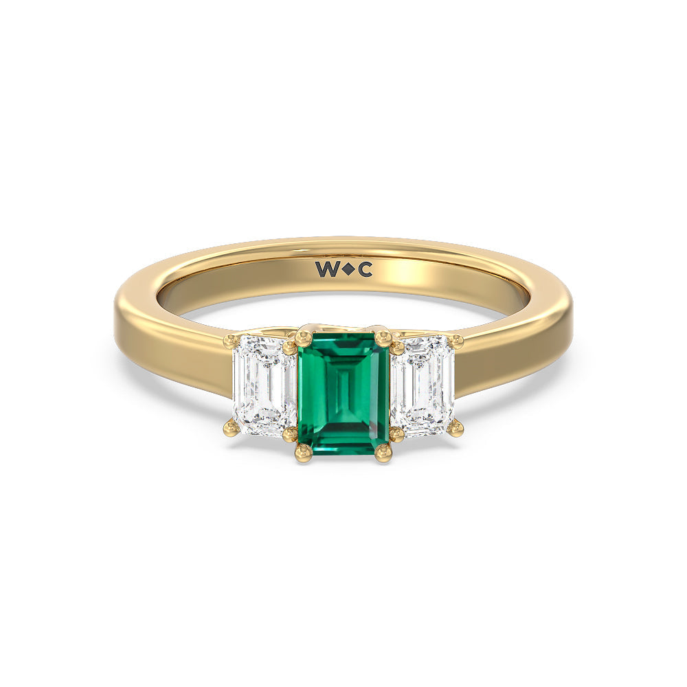 Created Emerald Center And Emerald Shape Cut Three Stone Diamond Ring with 14KT Yellow Gold Cut Diamond in 14KT Yellow Gold view 1
