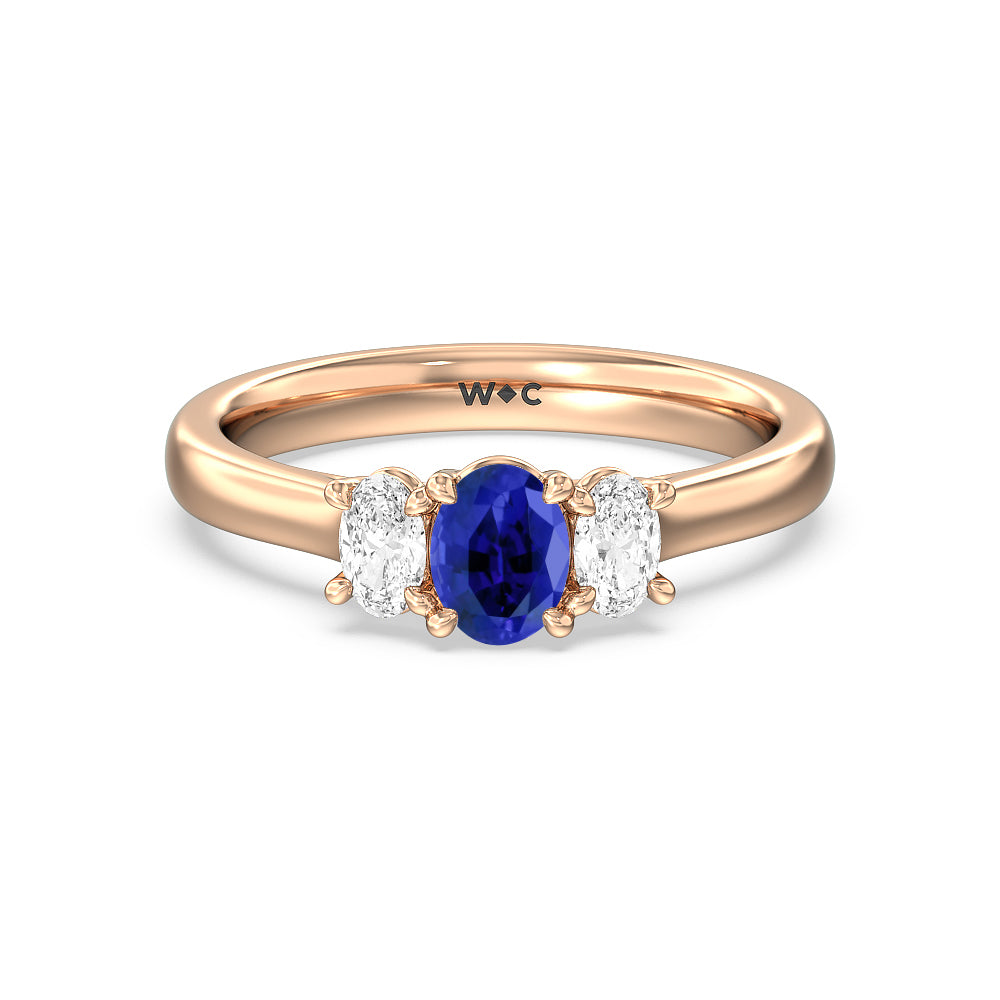 Created Sapphire Center And Oval Cut Three Stone Diamond Ring with 14KT Rose Gold Cut Diamond in 14KT Rose Gold view 1

