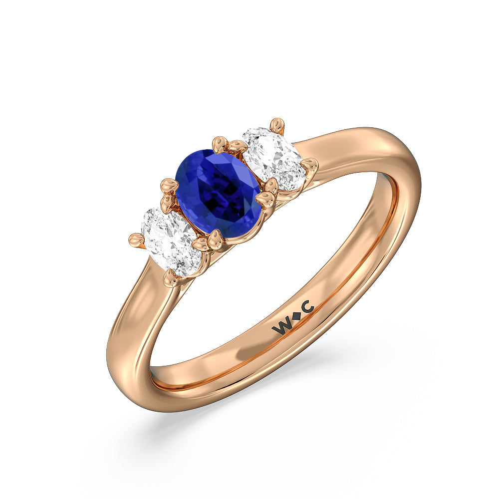Created Sapphire Center And Oval Cut Three Stone Diamond Ring with 14KT Rose Gold Cut Diamond in 14KT Rose Gold view 2
