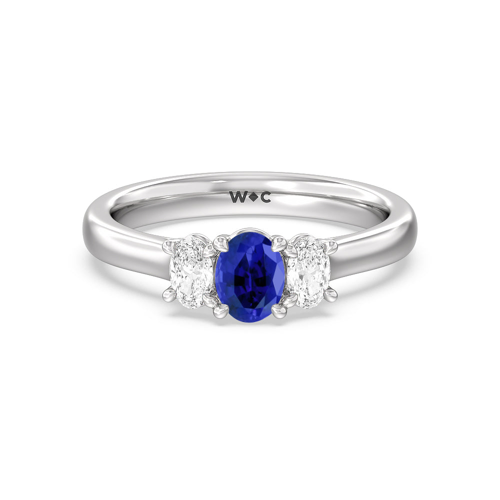 Created Sapphire Center And Oval Cut Three Stone Diamond Ring with 14KT White Gold Cut Diamond in 14KT White Gold view 1
