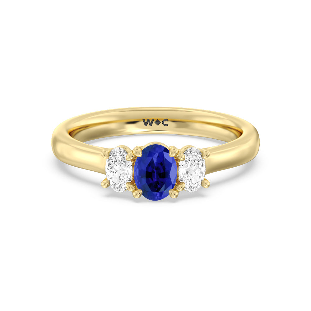 Created Sapphire Center And Oval Cut Three Stone Diamond Ring with 14KT Yellow Gold Cut Diamond in 14KT Yellow Gold view 1
