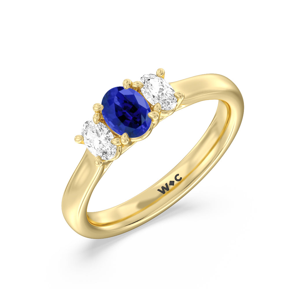Created Sapphire Center And Oval Cut Three Stone Diamond Ring with 14KT Yellow Gold Cut Diamond in 14KT Yellow Gold view 2
