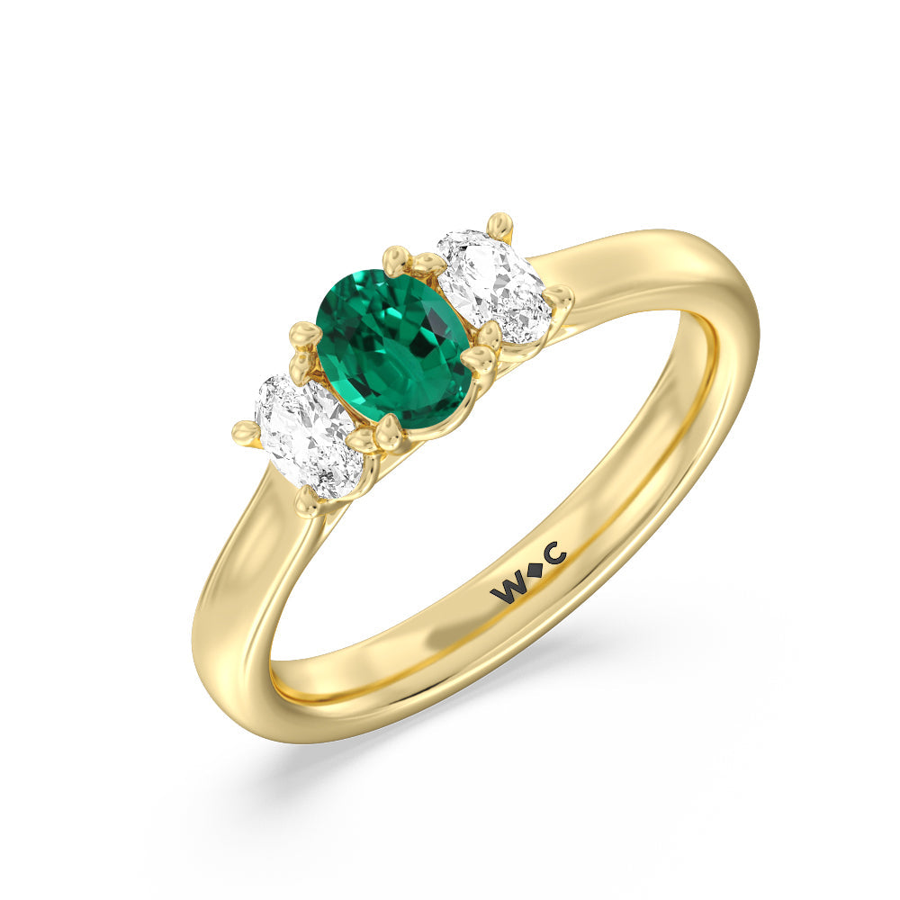 Created Emerald Center And Oval Cut Three Stone Diamond Ring with 14KT Yellow Gold Cut Diamond in 14KT Yellow Gold view 2
