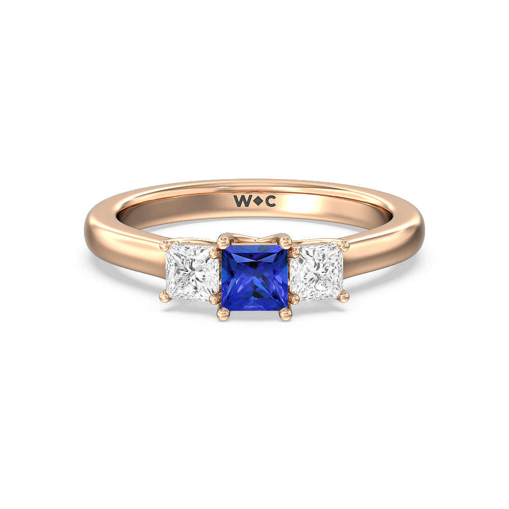 Created Sapphire Center And Princess Cut Three Stone  Diamond Ring with 14KT Rose Gold Cut Diamond in 14KT Rose Gold view 1

