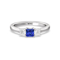 Created Sapphire Center And Princess Cut Three Stone Diamond Ring