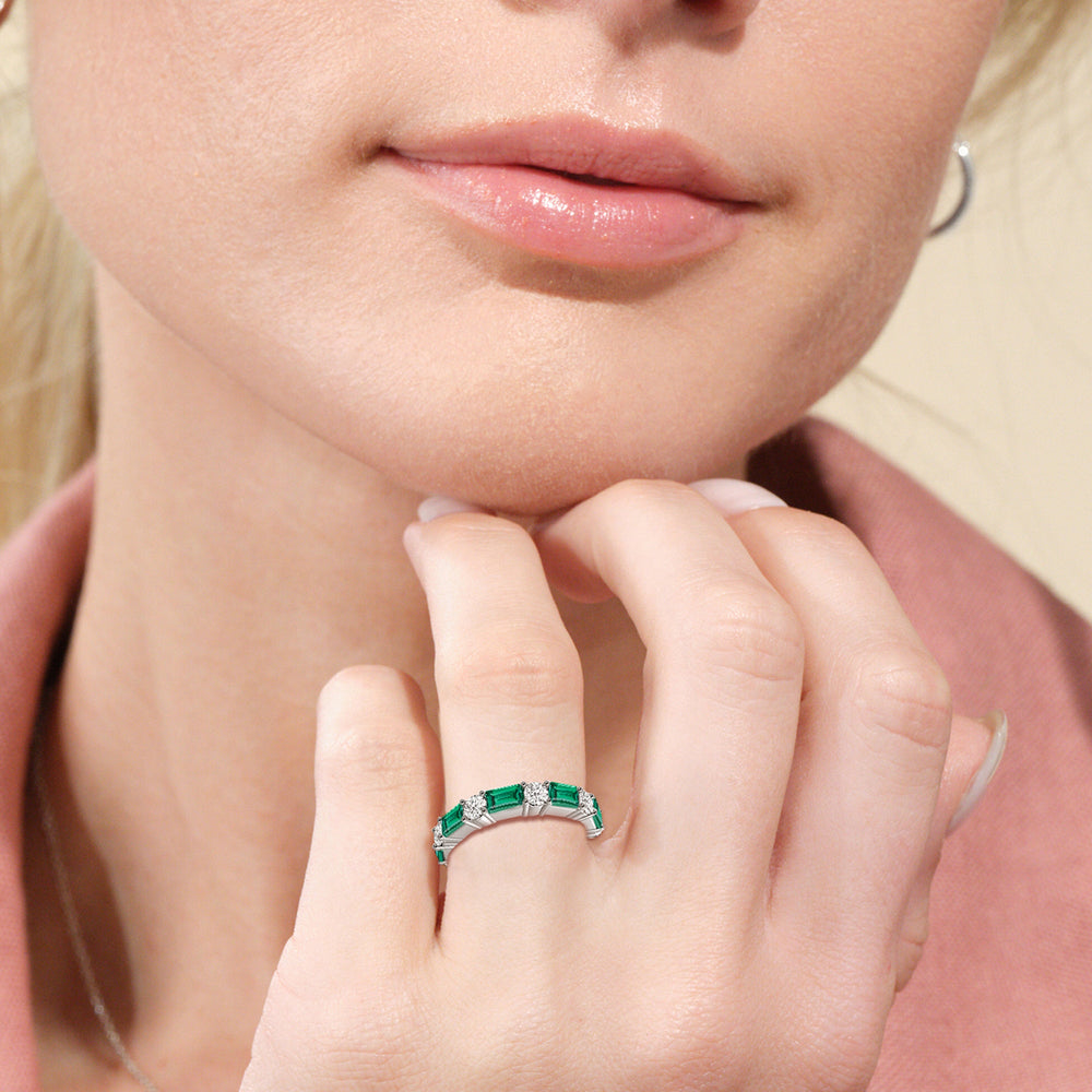 Model Wearing Geometric Sequence Created Emerald and Round Diamond Eternity Ring view