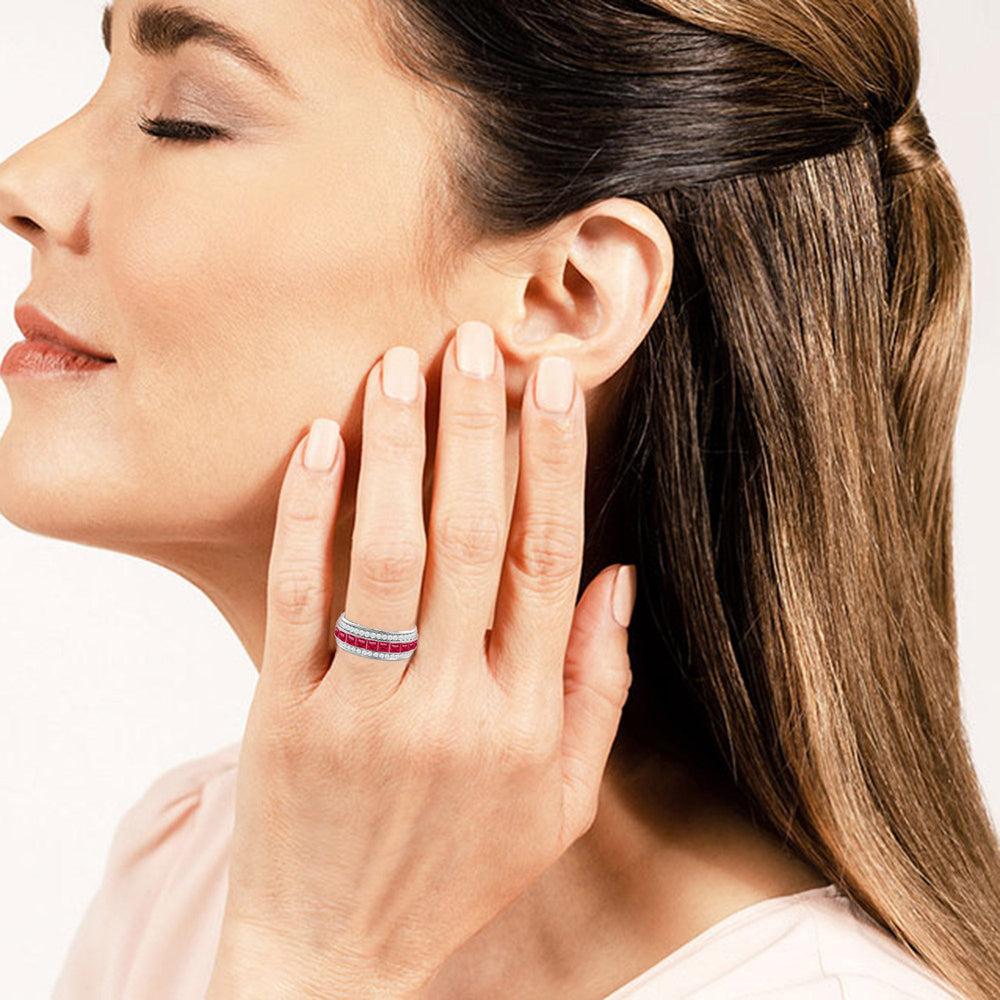 Model Wearing Triple Row Created Ruby Princess and Round Diamond Eternity Ring Size 7.5 view