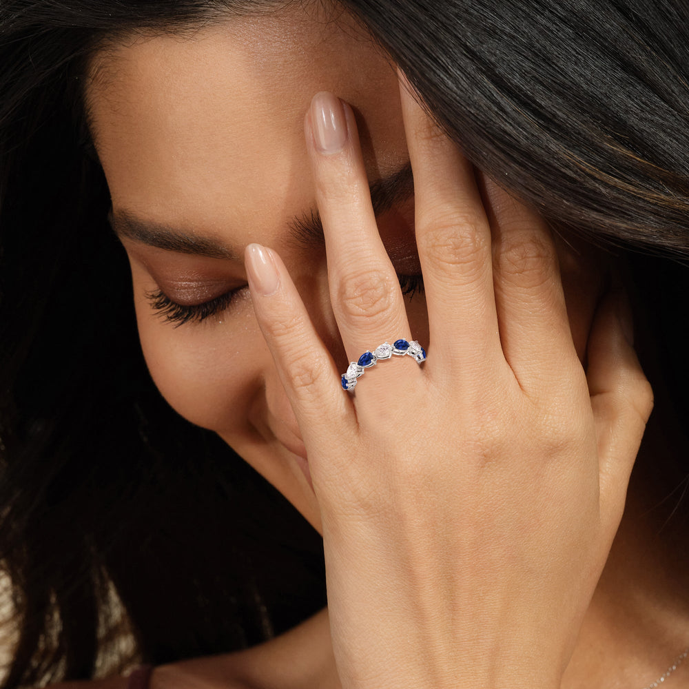 Model Wearing Trailing Created Sapphire Pear and Diamond Anniversary Ring view