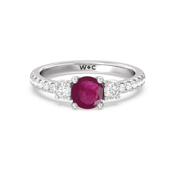 round ruby and lab diamond classic three stone ring with studded shank