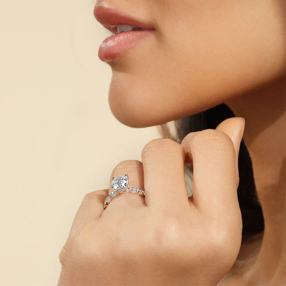 Model Wearing Modern East West Hidden Halo Engagement Ring with Lab Grown Diamond view