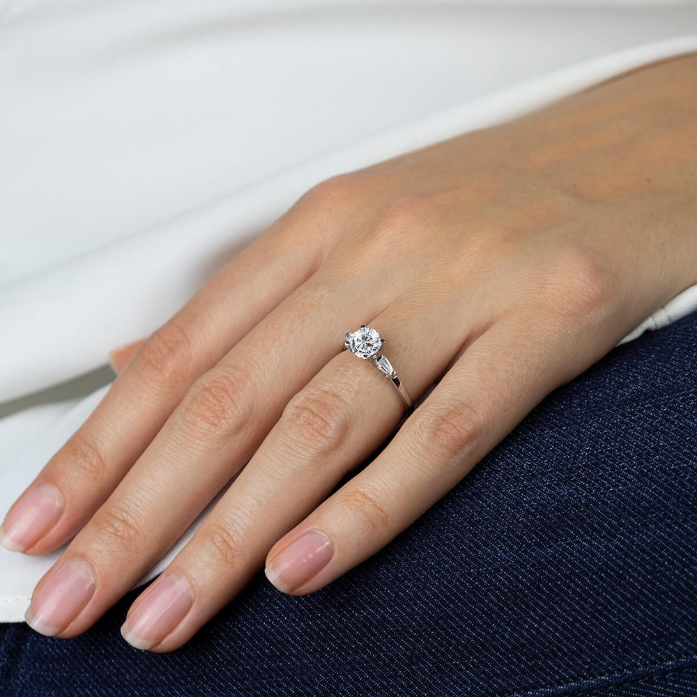 Model Wearing Three Stone Baguette Engagement Ring view