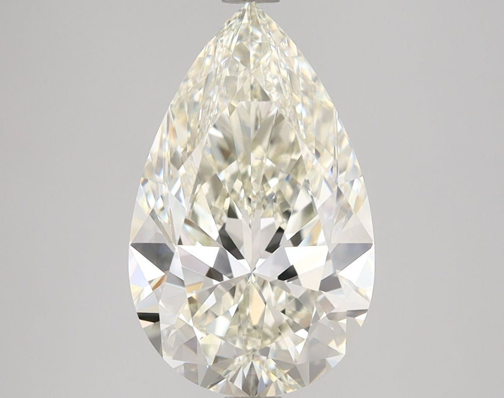 3.11 Carat Pear Natural Diamond with  Cut Diamond in 14KT  view 1
