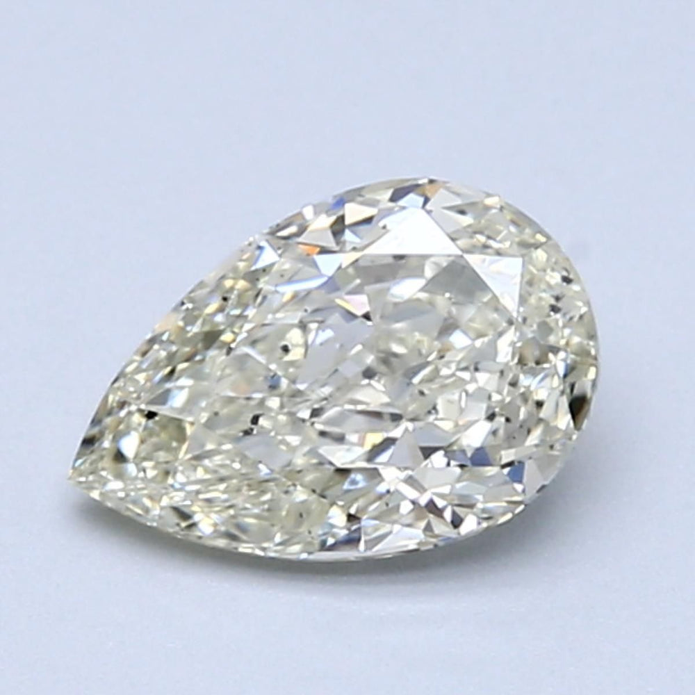 1.01 Carat Pear Natural Diamond with  Cut Diamond in 14KT  view 1
