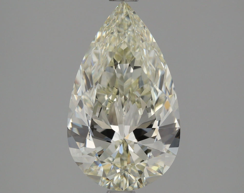 2.06 Carat Pear Natural Diamond with  Cut Diamond in 14KT  view 1
