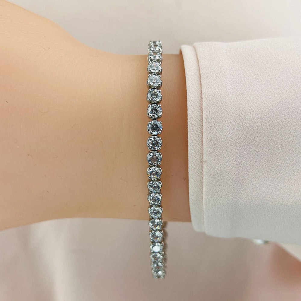 Model Wearing Lotus Prong Round Lab Diamond Tennis Bracelet view