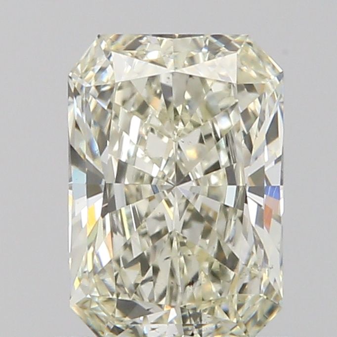 0.74 Carat Radiant Natural Diamond with  Cut Diamond in 14KT  view 1
