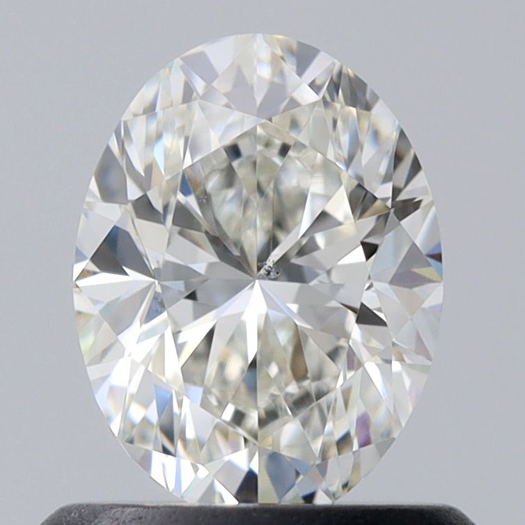 0.71 Carat Oval Natural Diamond with  Cut Diamond in 14KT  view 1
