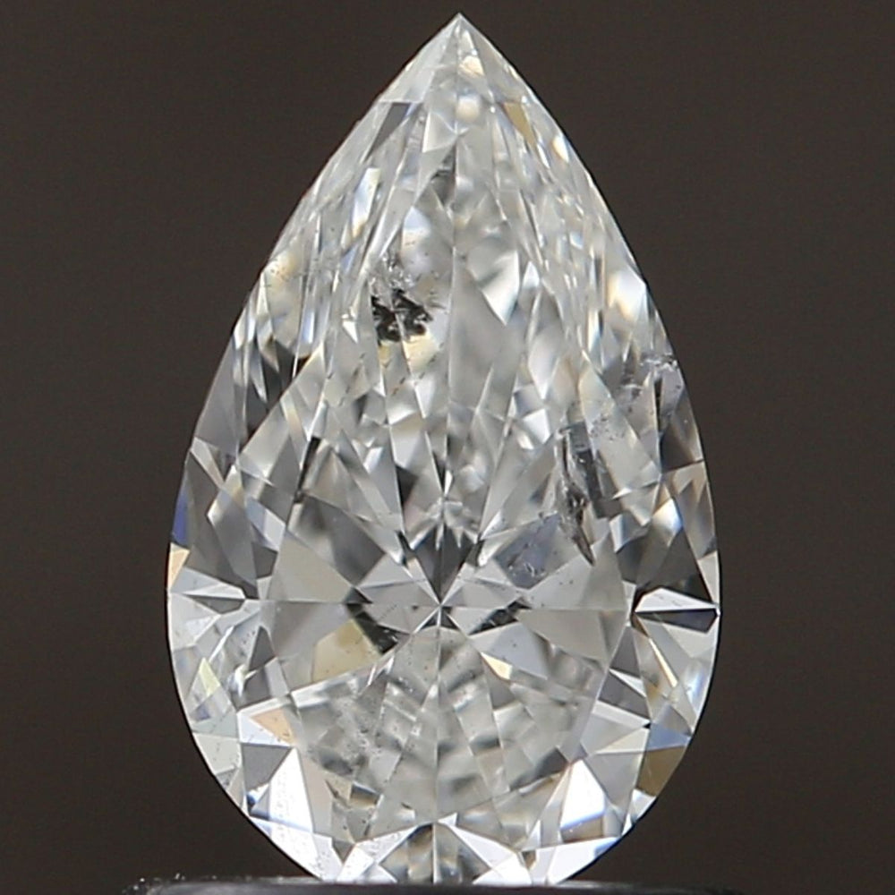 0.7 Carat Pear Natural Diamond with  Cut Diamond in 14KT  view 1
