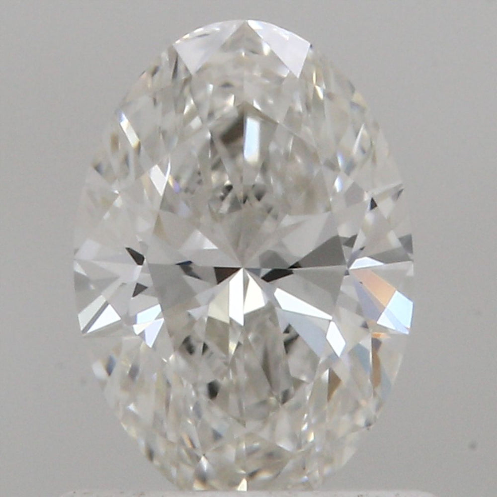 0.7 Carat Oval Natural Diamond with  Cut Diamond in 14KT  view 1
