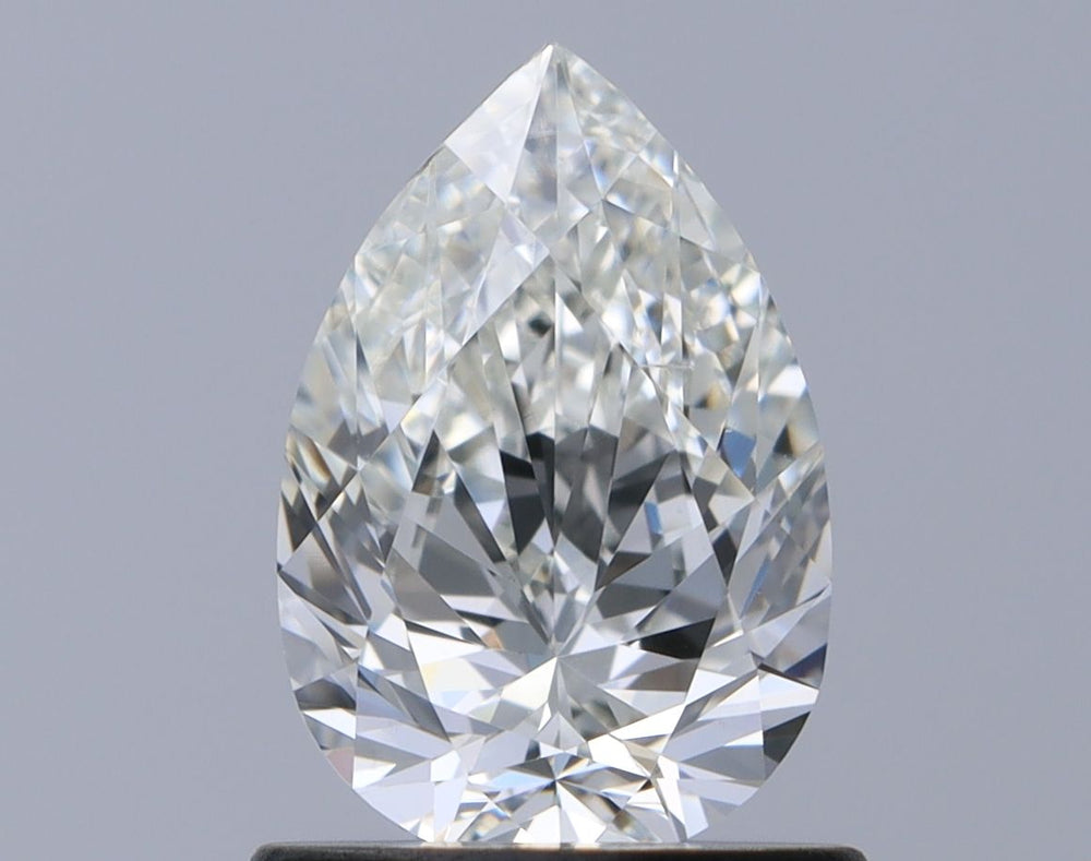 0.9 Carat Pear Natural Diamond with  Cut Diamond in 14KT  view 1
