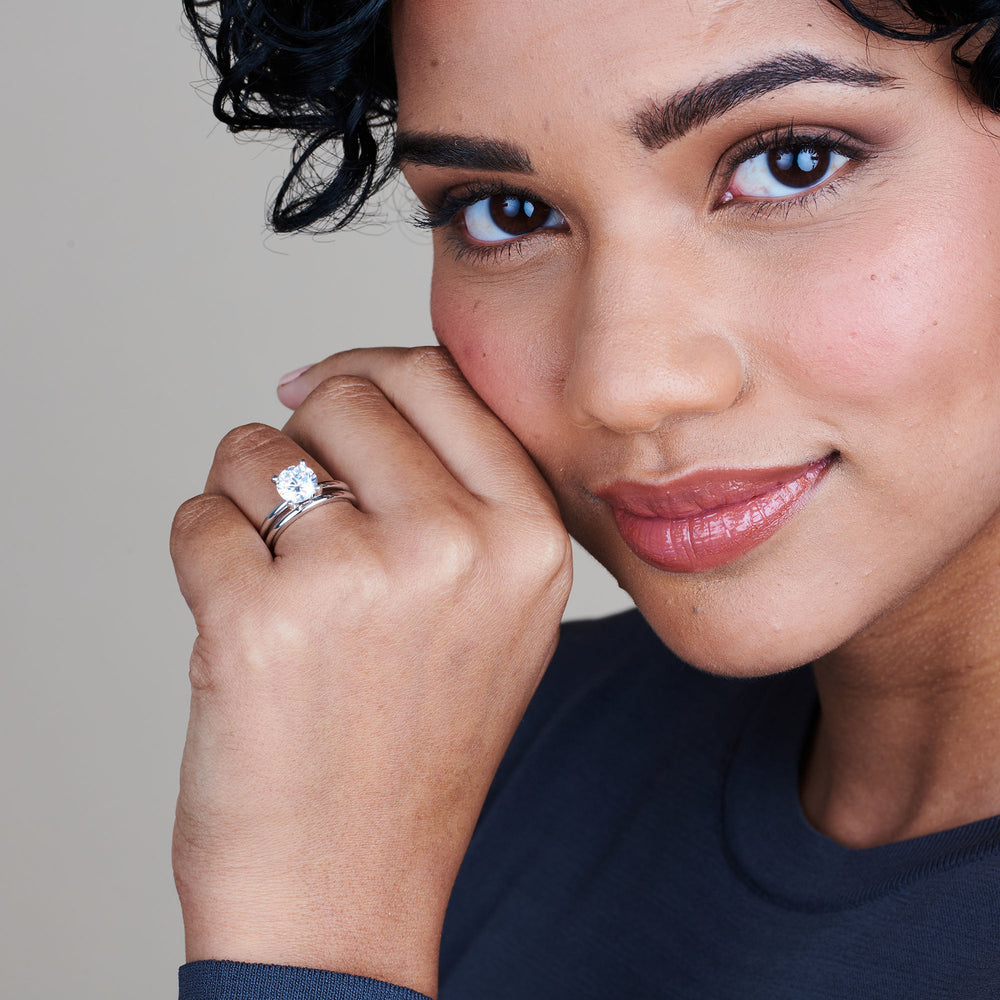 Model Wearing Classic Solitaire Women's Wedding Band view