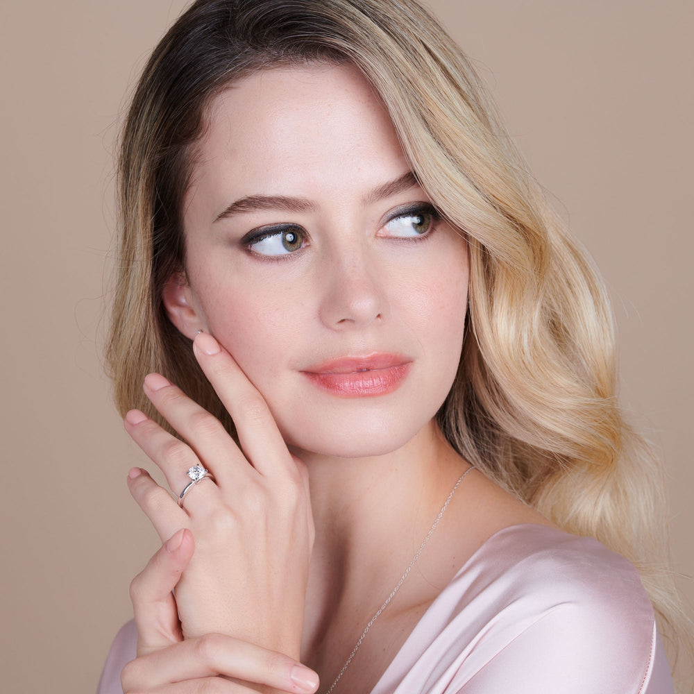Model Wearing Adorned Hidden Accent Diamond Engagement Ring with Lab Grown Diamond view