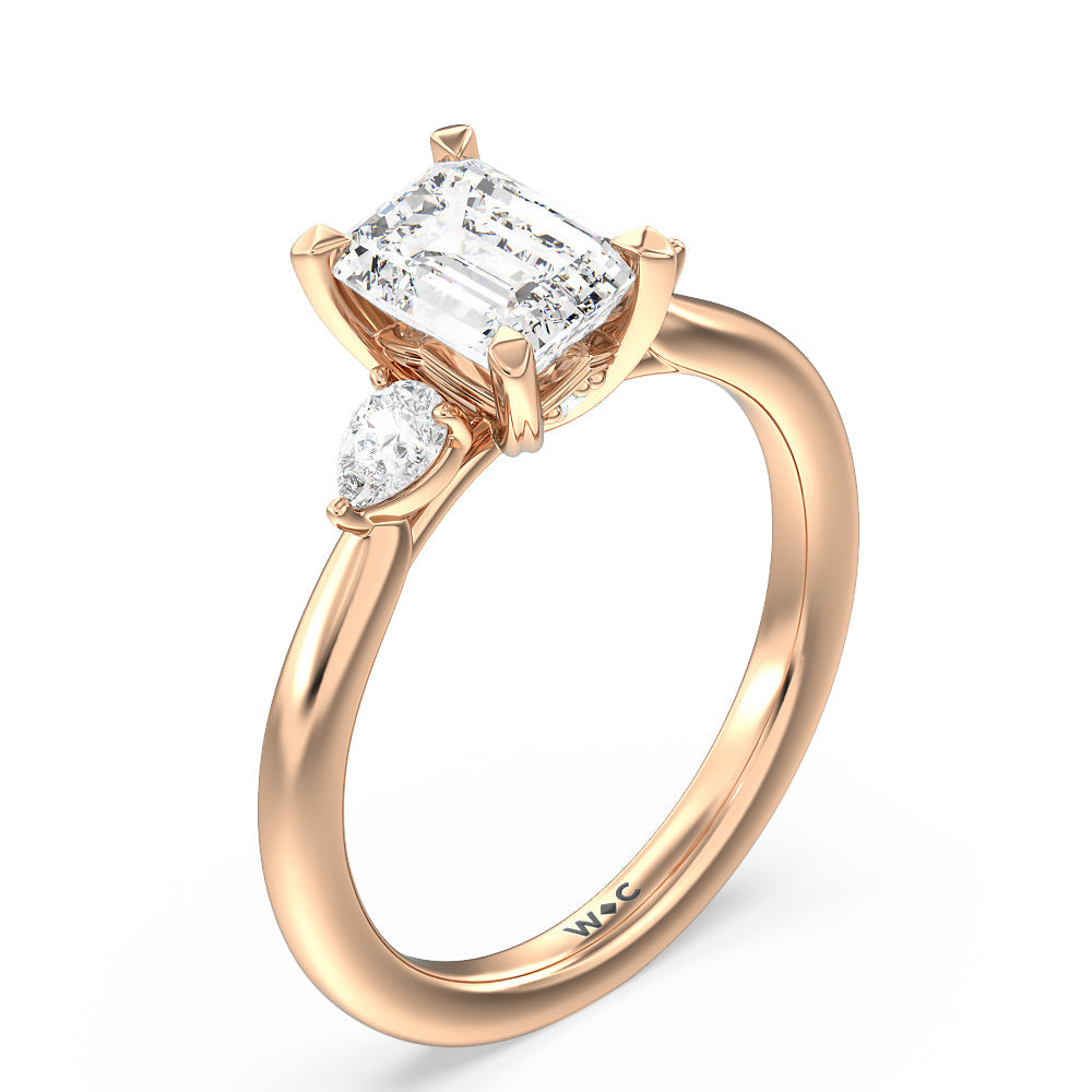Fine Line Pear Three Stone Engagement Ring with Emerald Cut Diamond in 14KT Rose Gold view 3
