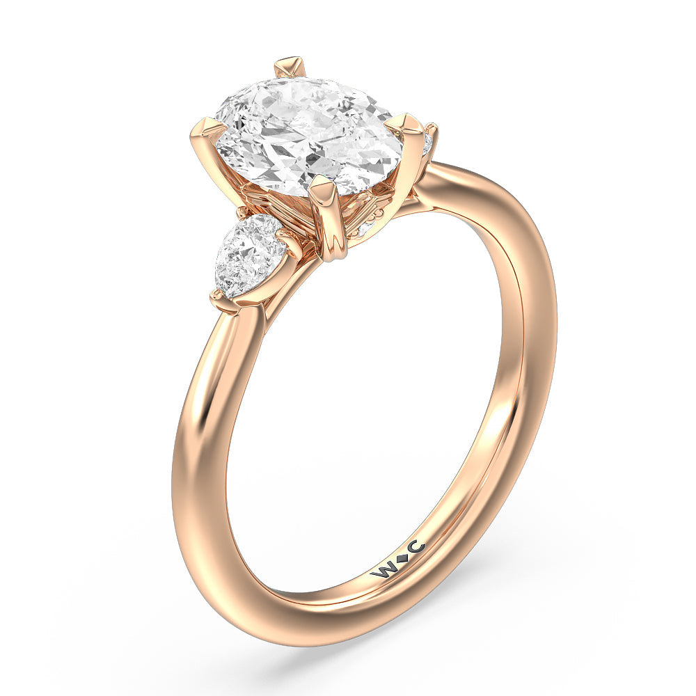 Fine Line Pear Three Stone Engagement Ring with Oval Cut Diamond in 14KT Rose Gold view 3
